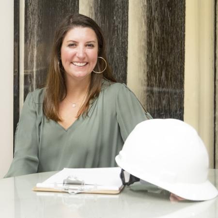 Woman with white hard hat